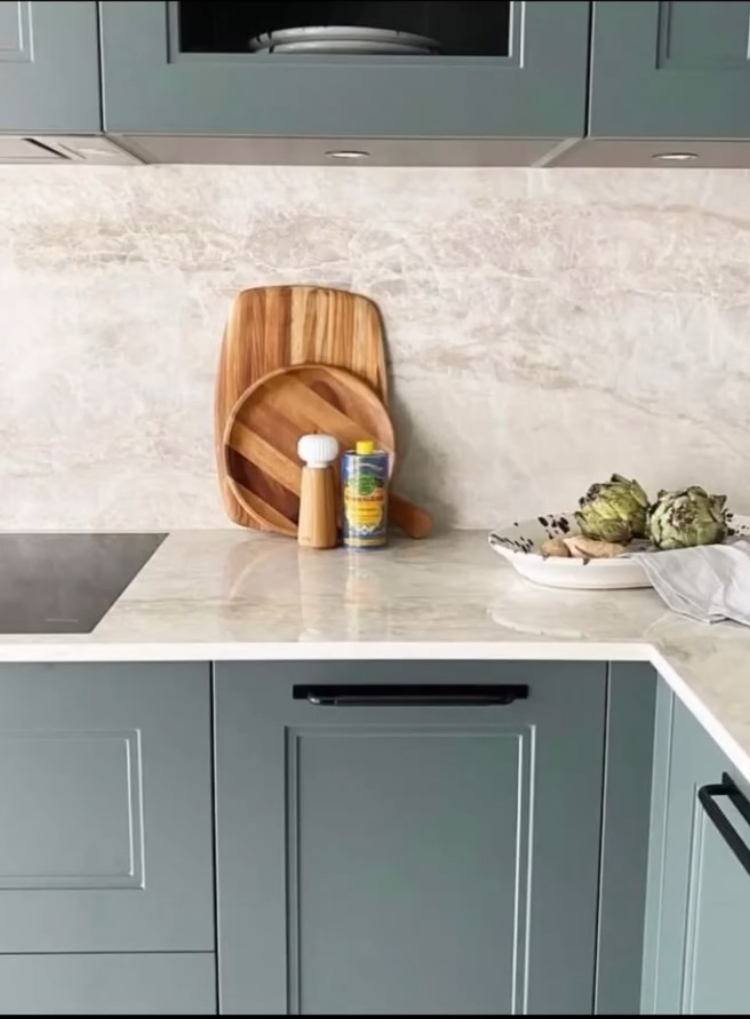 Quartz countertop, tile backsplash and custom cabinetry in Palm Beach Gardens kitchen
