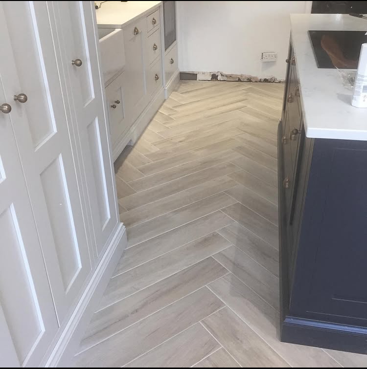 Custom cabinets, gold hardware, blue island, white granite countertop in Jupiter Florida kitchen renovation